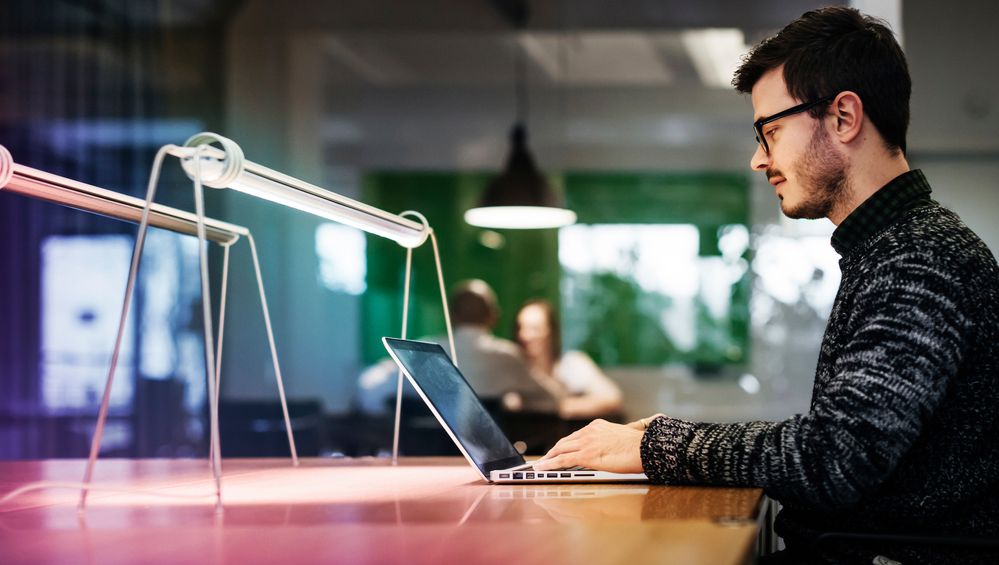 young-businessman-working-late-in-his-office-607477451-hero-medium[1].jpg