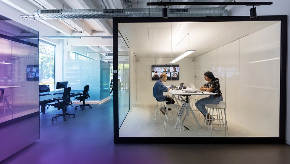 Business-people-working-in-hybrid-office-space-1327497994-hero-medium[1].jpg